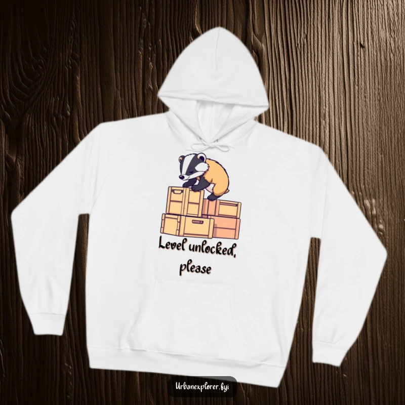 Funny badger character climbing stacked crates with determination, depicted as cozy and resilient, ideal for a funny gift hoodie.