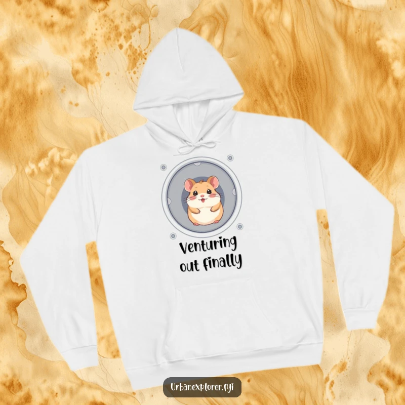 Funny hamster with a cheerful expression, peeking from a ventilation shaft, on a soft hoodie.