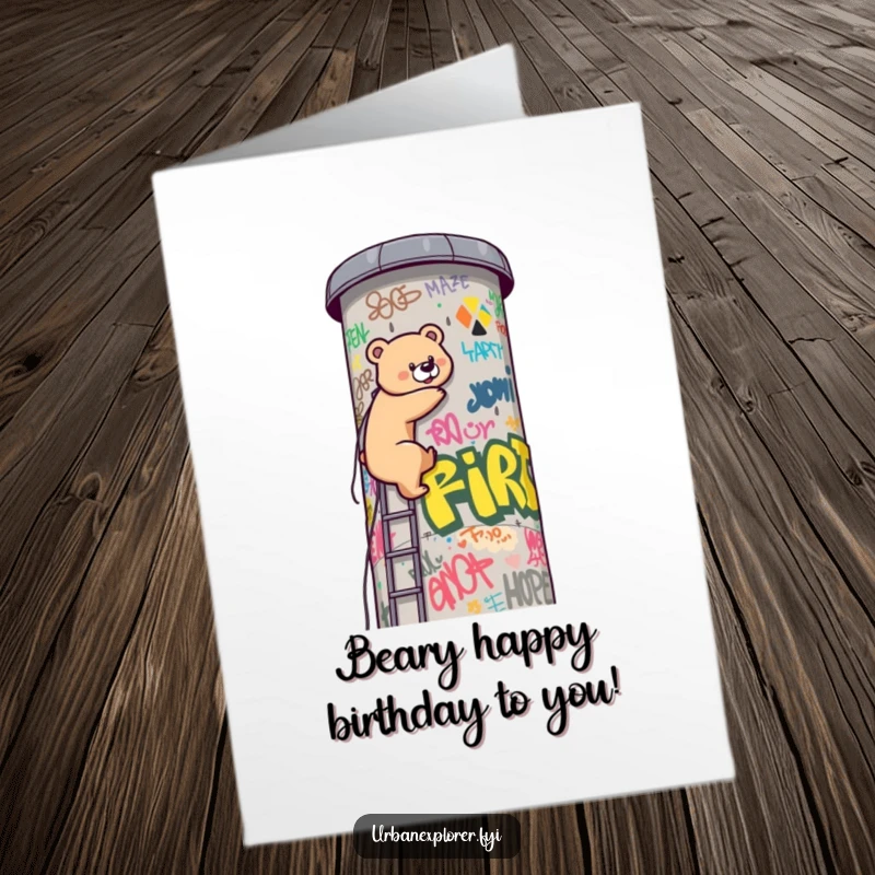 Funny Free Printable Birthday Card: Kawaii bear determinedly climbs a graffiti water tower, ready for a wild celebration.