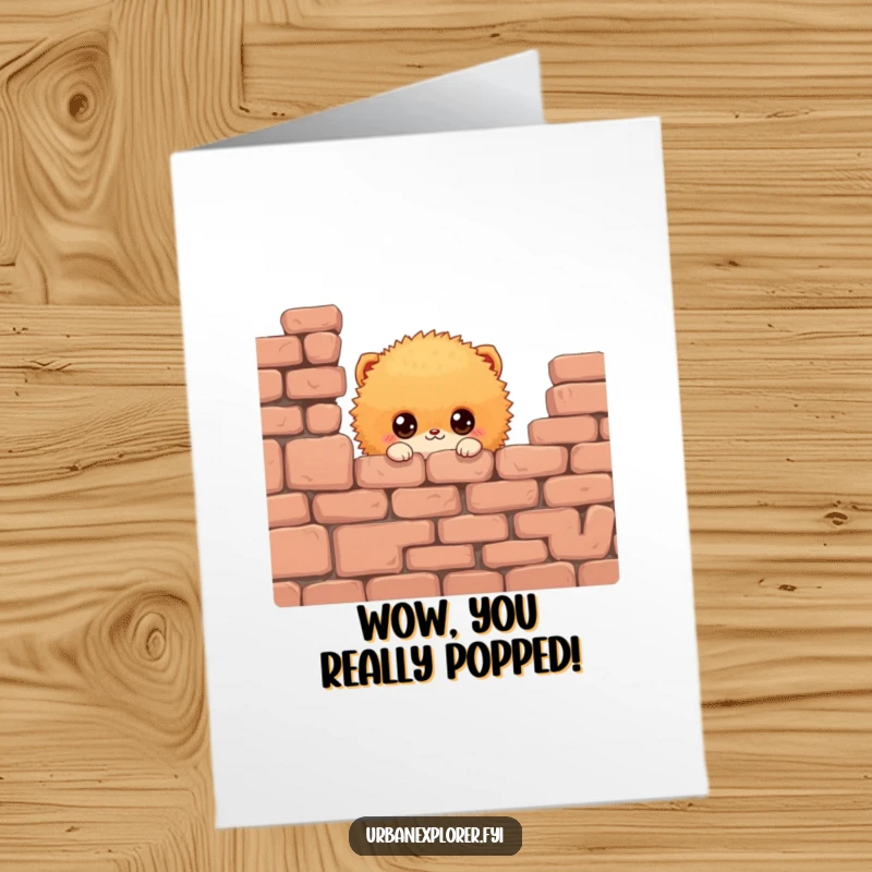 Funny Free Printable Congratulations Card: Small orange fluffy creature with big eyes peeking from wall. A surprising and downloadable greeting.
