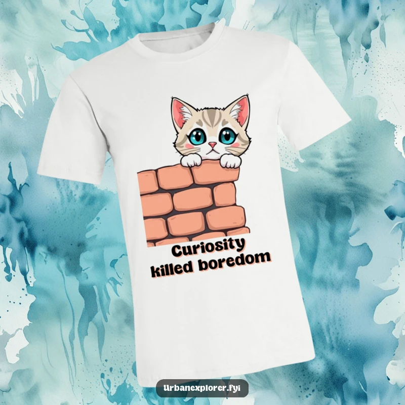 Funny curious cat looking over a crumbling brick wall with wide, wondering eyes, printed on a humorous t-shirt.