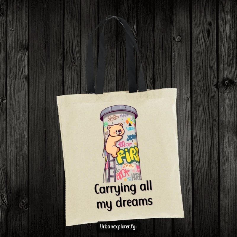 Funny Kawaii bear, full of grit, ascending a graffiti water tower on this sturdy and funny tote bag. A humorous carry-all.