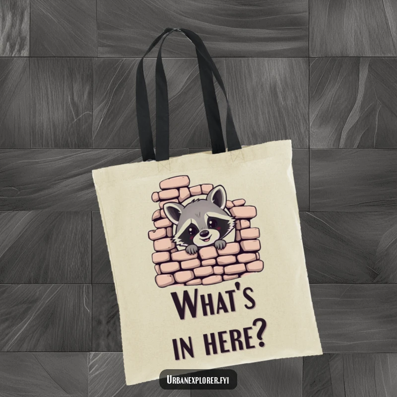 Funny tote bag featuring a cheerful raccoon peeking from a crumbling brick wall, a humorous and practical accessory.